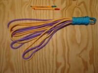 Purple and yellow loop flogger Loop flogger of 8 mm cord in yellow and purple with a turquoise handle