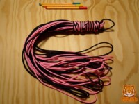 Black and pink loop flogger Loop flogger in pink and black