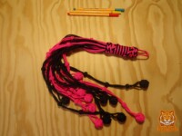 Pink and black ball flogger Ball flogger in a pink bicolour and black